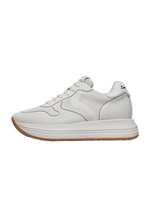 White mesh sneakers with a textured upper, round toe, and a flexible rubber sole. Features perforated accents and subtle branding on the tongue.