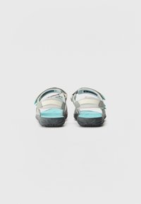 Gray and light blue sandals with adjustable straps, rubber soles, open toe design, and textured footbed for grip and comfort.
