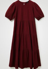 Robe bordeaux, longueur genou, en tissu texturé, avec des manches bouffantes courtes, un col rond et une jupe à volants. Détail en forme de clé à l'arrière.