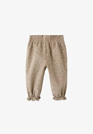 Beżowe bawełniane spodnie z drobnym kwiatowym wzorem, elastycznym paskiem i marszczonymi mankietami przy kostkach. Faktura materiału dodaje wizualnego zainteresowania.