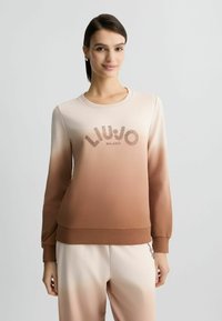 Bruine en crèmekleurige sweatshirt met een ronde halslijn, lange mouwen en het logo "LIU JO MILANO" in versierde letters op de voorkant.