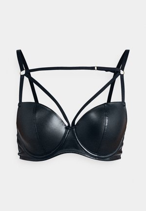 Zwarte bh met voorgevormde cups, verstelbare bandjes en een geometrisch bandontwerp. Gladde textuur en minimalistische hardwareaccenten.