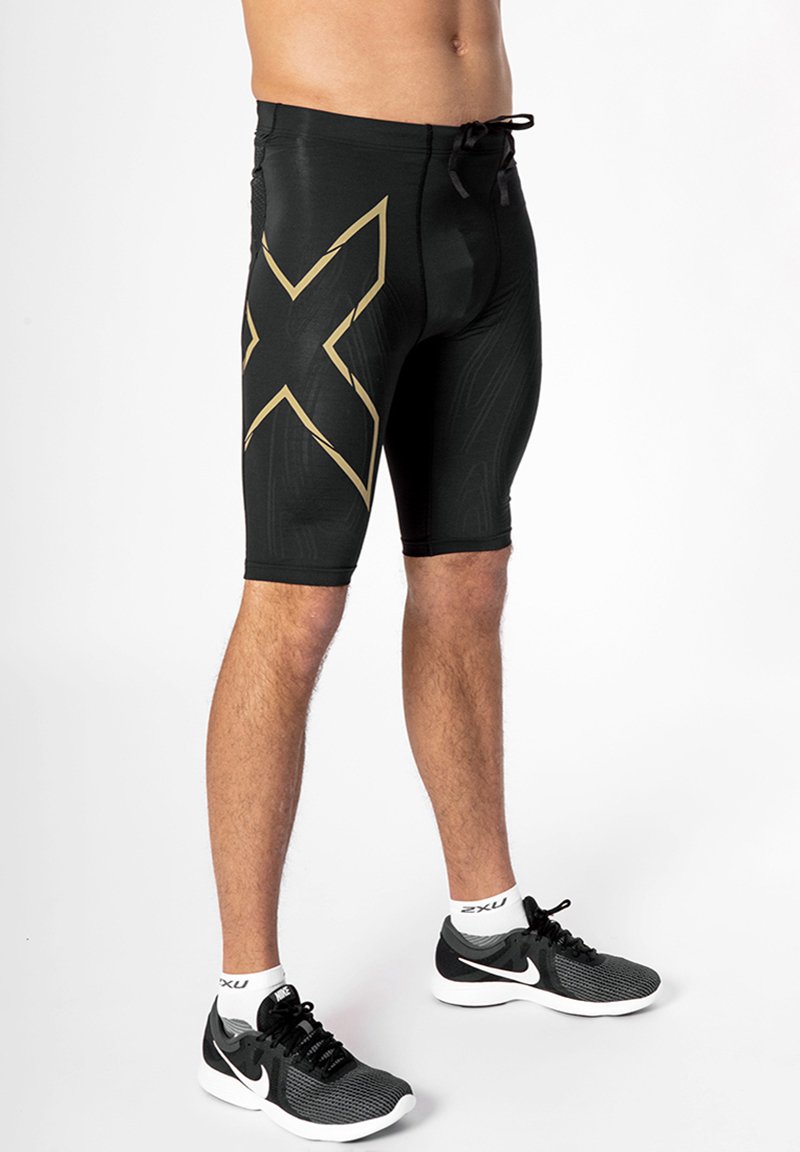 2XU Sports shorts black/gold reflective/black Zalando.ie