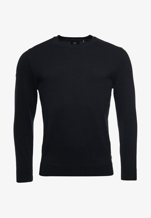 Pull noir à manches longues avec col rond, coupe ajustée, poignets et ourlet côtelés, sur fond blanc.