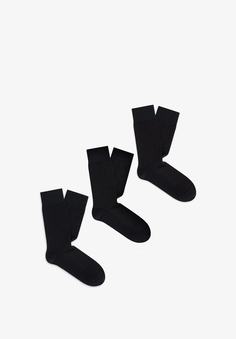 Czarne skarpetki z teksturowanym wzorem z małymi kropkami, wykonane z miękkiego materiału. Każda para ma gładki czarny ściągacz i wzmocniony palec.