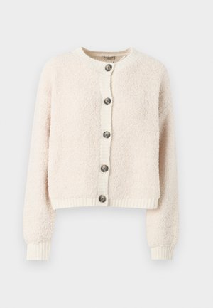 Cream-colored cropped cardigan made of textured fabric, featuring a round neckline, button front, and ribbed cuffs and hem.
