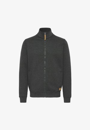 Tumedast hallist värvist kapuutsiga tõmblukuga sviiter, küljetaskud, soonikkoes mansetid ja väike nahast logo silt allservas. Pehme tekstuur.