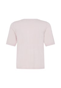 Haut en jersey rose clair uni à manches courtes avec un col rond, vu de dos sur un fond blanc.