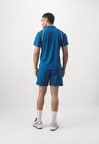 ASICS MATCH SHORT - Spordišortsid - mako blue