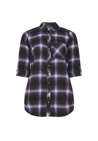 Mustassa ja purppurassa ruudullisessa Paidassa on napitettu etuosa, kaulus ja rullatut hihat. Siinä on rintatasku ja rento istuvuus.