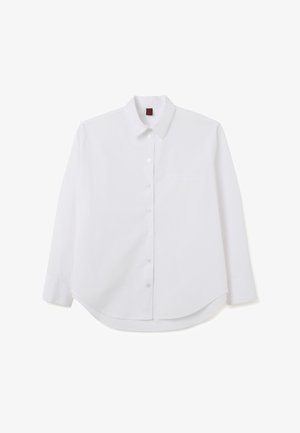 Camicia bianca a maniche lunghe in cotone con colletto button-down, una tasca sul petto e orlo curvo. Texture liscia con bottoni lucidi.