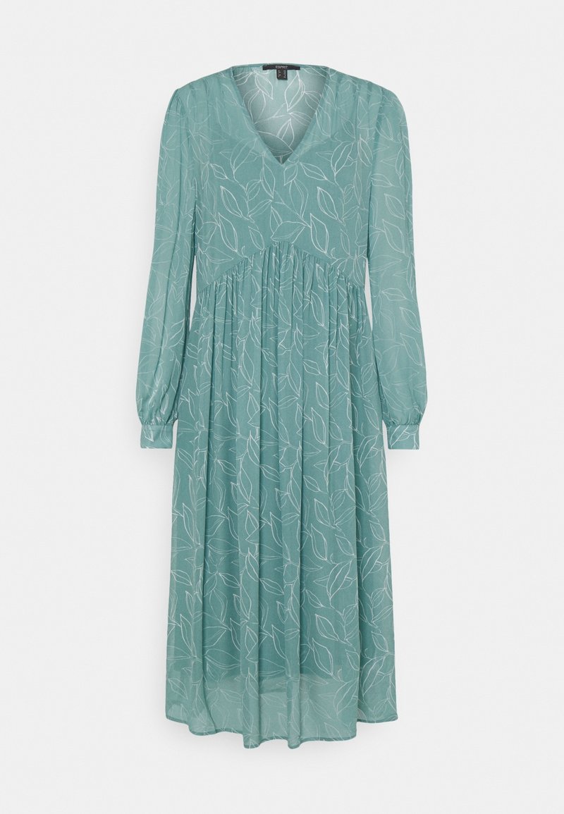 Robe longue bleu sarcelle avec motif de feuilles blanches, manches longues avec poignets, décolleté en V et taille froncée.