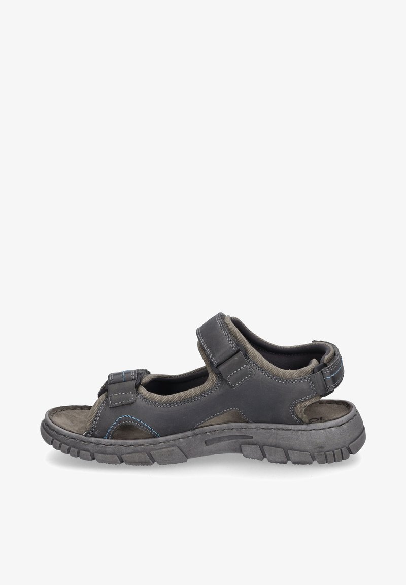 Sandały sportowe w ciemnoszarym i jasnoszarym kolorze z rzepami, teksturowaną wkładką oraz gumową podeszwą z głębokim bieżnikiem dla lepszej przyczepności.