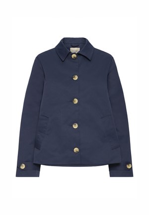 Tumesinist värvi jakk, mis on valmistatud siledast materjalist, varustatud klassikalise krae, kuue messingist nupu ja küljetaskutega. Detailidena on nööpidega varrukakitsendid.