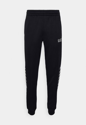 TROUSER - Tracksuit bottoms - black/white