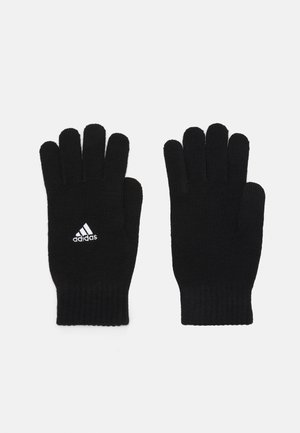Schwarze gestrickte Handschuhe mit fünf Fingern. Mit einem gerippten Saum und einem kleinen weißen Adidas-Logo im Handgelenkbereich. Weiche Textur.