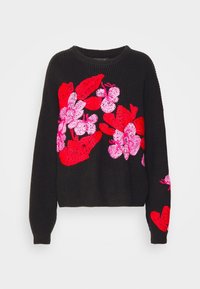 Svart stickad tröja med livfulla rosa och röda blommor broderade över framsidan. Rund halsringning och långa ärmar.