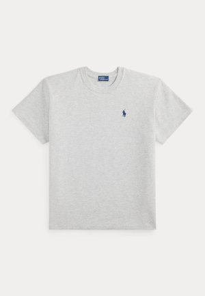 Helehall lühikeste varrukatega T-särk ümara kaelusega, vasakul rinnal väike tumesinine Polo Ralph Laureni logo.