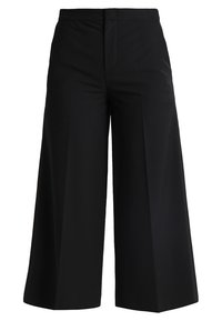 Black wide-leg trousers with a high waist, tailored design, and crisp fabric, featuring front pleats and no visible pockets.