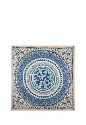 Tissu carré avec des motifs circulaires concentriques en bleu, blanc et beige présentant des dessins floraux et géométriques.