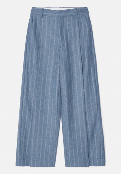 Light blue wide-leg trousers with vertical white stripes, a flat front, belt loops, and a textured fabric finish.