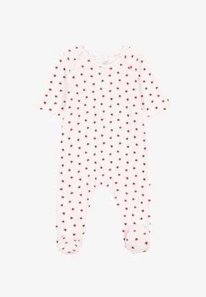 Combinaison pour bébé en tissu blanc doux avec un imprimé de cœurs rouges. Dotée de manches longues, d'un design avec pieds et de fermetures à pression au niveau du cou et du bas.