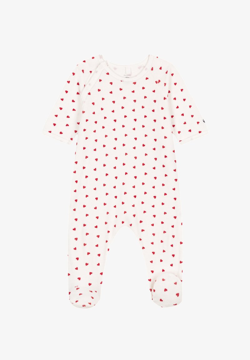 Kūdikių romperis iš minkštos baltos medžiagos su raudonų širdelių raštu. Turi ilgus rankovės, kojinaites ir snapelių uždarymą kaklo ir apačioje.