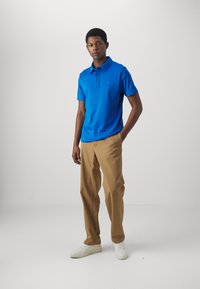 Michael Kors SLEEK - Polo krekls - grecian blue