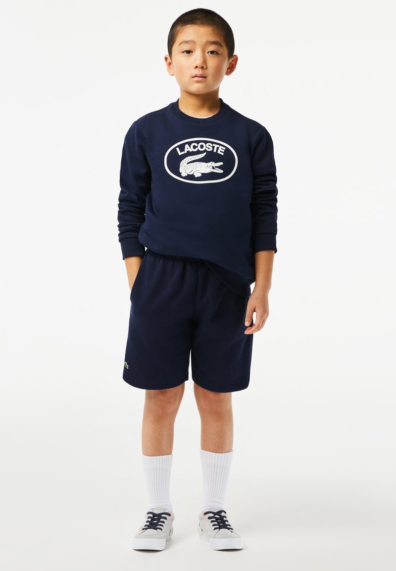 Lacoste - SPORTS CLASSIC UNISEX - Športové šortky - navy blue, Zväčšiť