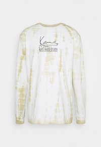 Long-sleeve tie-dye shirt in white with light green accents. Features a logo print on the back and a crew neckline. Soft cotton material.