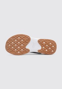 Suela de goma con un patrón texturizado, que cuenta con una mediasuela blanca y acentos en tono marrón. Diseñada para ofrecer tracción y flexibilidad en calzado deportivo.