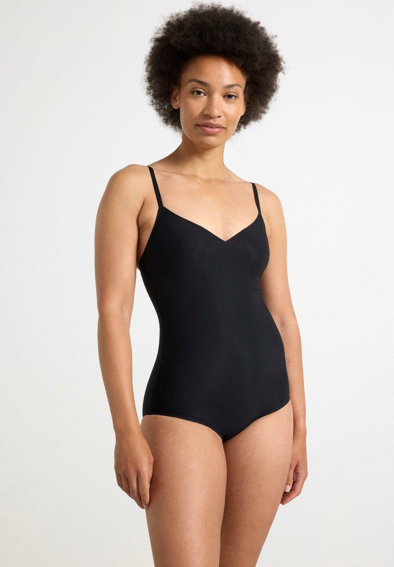Costume da bagno nero con scollatura a V, spalline sottili e texture liscia. Presenta una silhouette aderente che mette in risalto la forma del corpo.