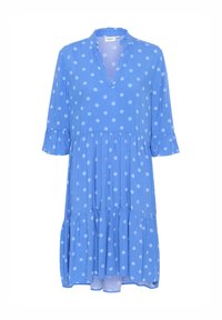 Blå prickig klänning med V-ringning, trekvartslånga ärmar, volangärmar och lager på lager- kjol. Tillverkad av lätt, flödande tyg.