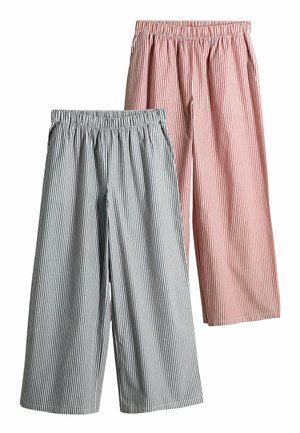 Two pairs of striped elastic waist pants, one grey and white, the other red and white, both wide-legged with side pockets.