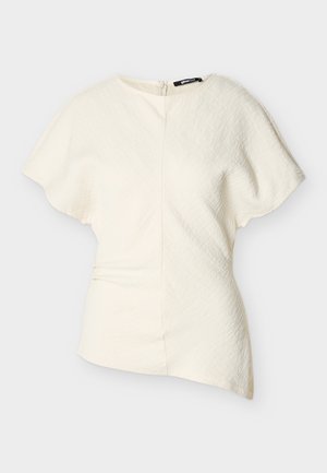 Bluza asimetrică cu mâneci scurte, de culoare albă-crem, din țesătură texturată și închidere laterală cu fermoar.