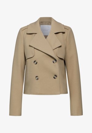 Béžový dvouřadý vlněný kabát s klopovým límcem, dlouhými rukávy a dvěma velkými knoflíky. Obsahuje přední kapsy s klopou a má přesný střih.