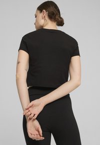 Puma CLASSICS - Pamata T-krekls - black