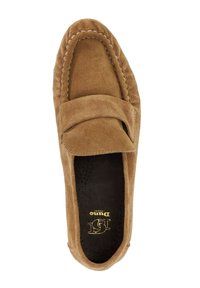 Brown suede moccasin shoe with a rounded toe, stitched detailing, and a raised strap across the instep. Textured insole visible.