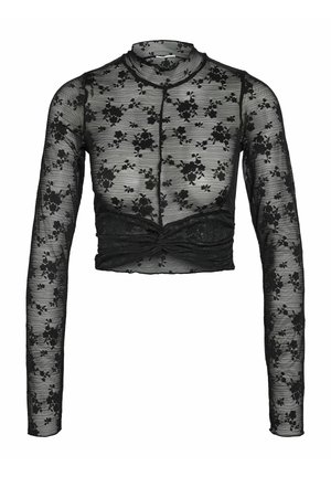 Musthave mustvalge pitsi musta värvi läbipaistev pikkade varrukatega peegel on põhjustatud lillemustriga, ümar kaelus ja volditud esiosa. Kerge kangas tagab vormitud ilme.