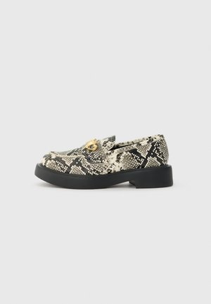 Snake print loafer with a flat black sole, featuring a gold accent on the front, made of textured material, with a rounded toe design.