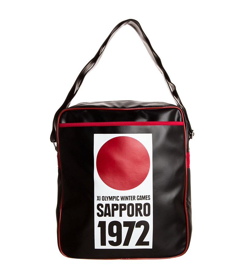 Black synthetic bag featuring red accents, a large white label with a red circle, "SAPPORO," and "XI OLYMPIC WINTER GAMES 1972" text.