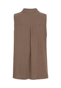 Udenærmet, brun linnedskjorte med krave, som har en rygskøt og en afslappet pasform. Teksturen er blød og let krøllet.