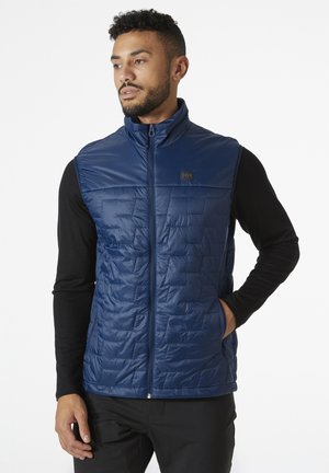 Chaleco acolchado azul con collar alto y cierre de cremallera, fabricado en material brillante. Presenta un pequeño logo y dos bolsillos laterales.