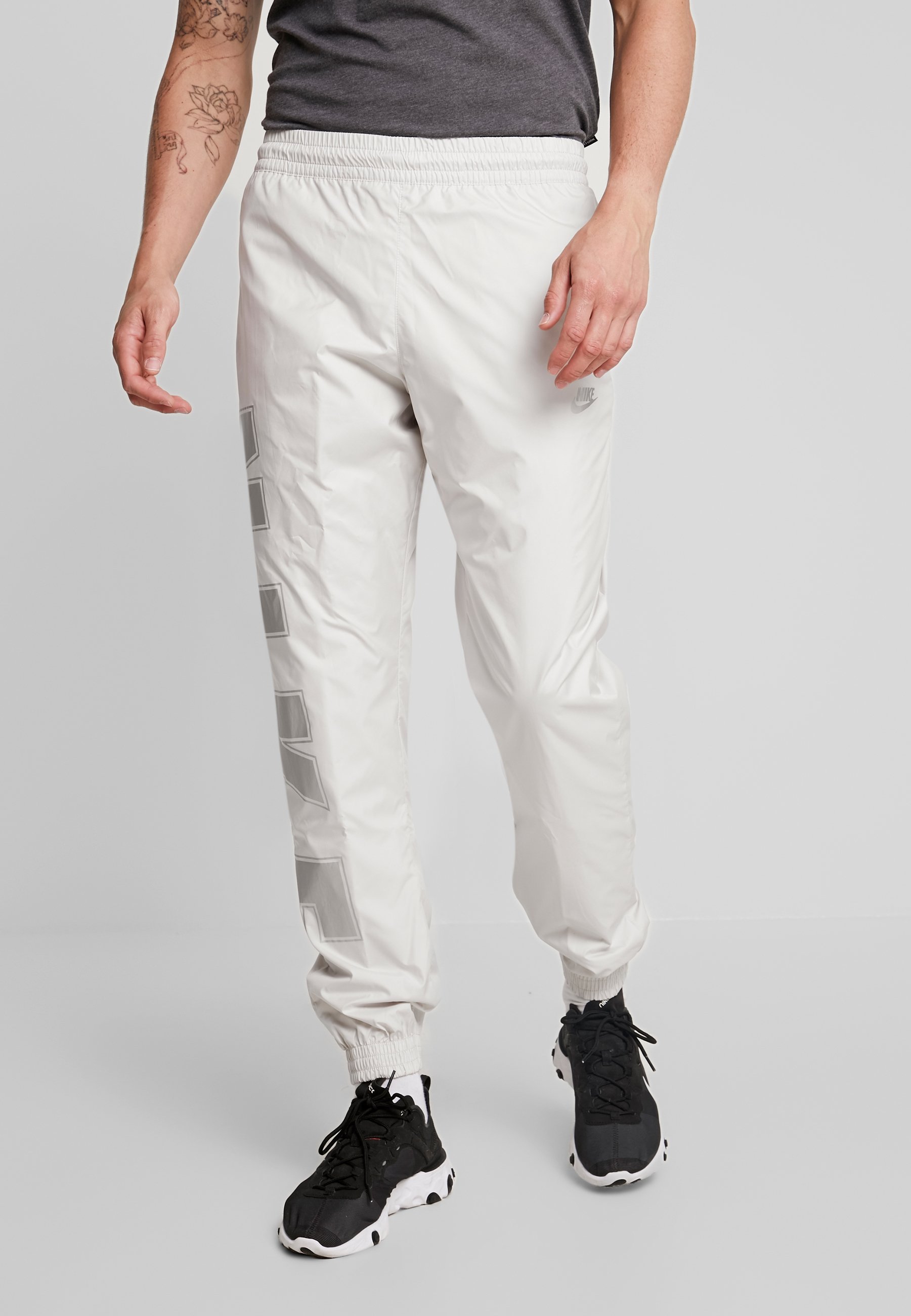 nike metallic tracksuit