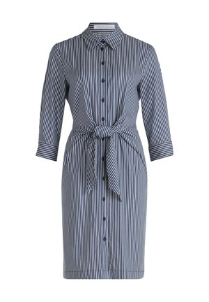 Gestreepte knoopjurk in marineblauw en wit, met een strik taille, lange mouwen en kraag. Beschikt over contrasterende knopen en een rechte zoom.