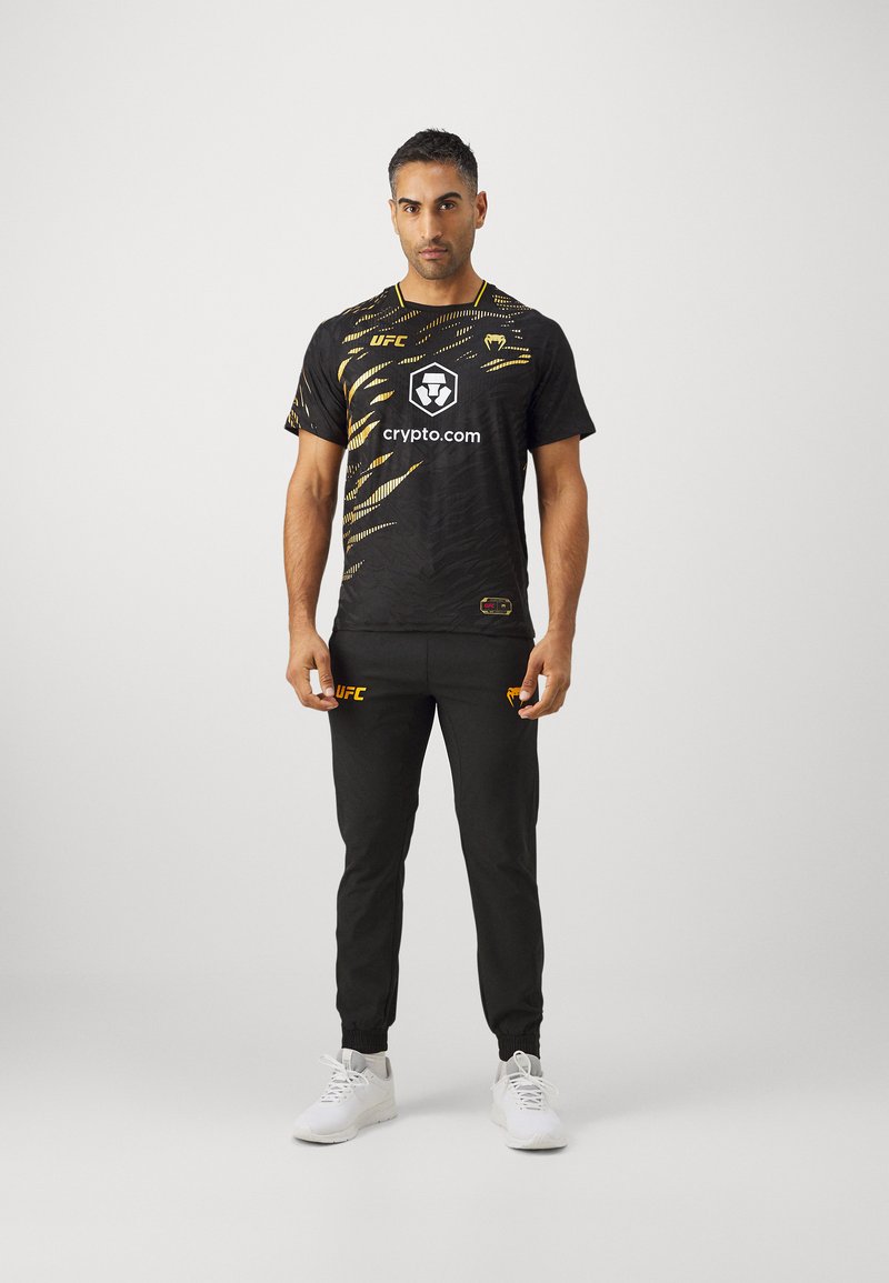 Camiseta Luchador MMA Camiseta UFC 2.0 - Réplica Oficial Hombre Corte  Regular Venum Fight Night