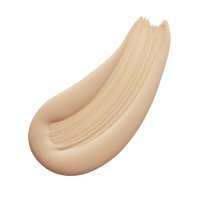 Tache de fond de teint liquide beige avec une texture lisse et crémeuse, présentant des traces visibles de pinceau sur un fond blanc.