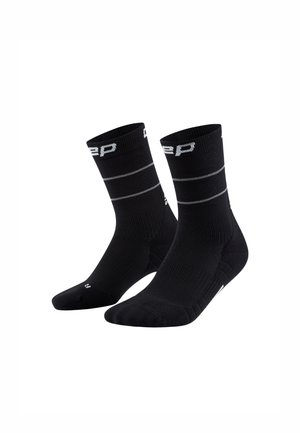 PRO RUN COMPRESSION REFLECTIVE MID CUT - Sports socks - black