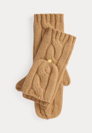 Tan knitted fingerless gloves with cable pattern and small gold button on a white background.