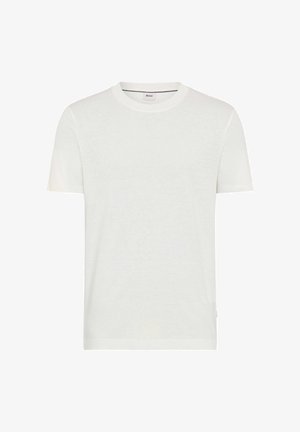 T-shirt bianca a maniche corte con scollo tondo, realizzata in tessuto leggero con una piccola etichetta del marchio all'interno del colletto.